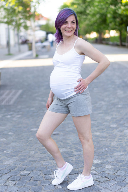 Bele nosečniške hlače